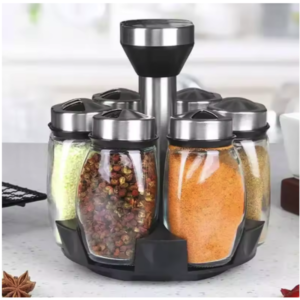 Especiero giratorio de cocina con tarros de cristal Especiero giratorio de cocina con tarros de vidrio y base rotatoria de 360 grados.