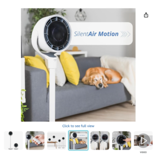 Ventilador circulador de aire Ufesa Kodiak de color blanco Ventilador circulador de aire Ufesa Kodiak SilentAirMotion en un salon con perro descansando